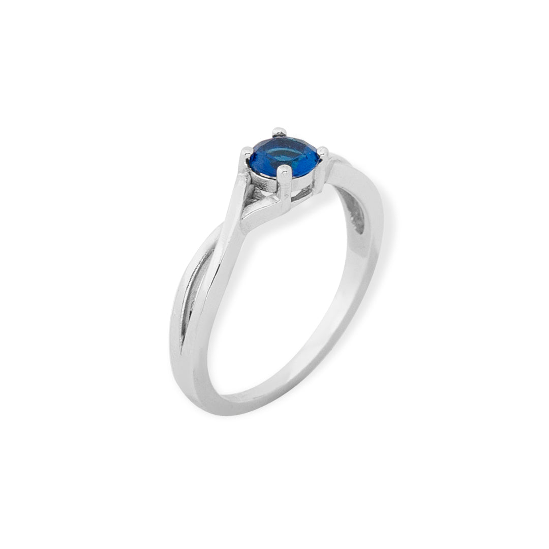 EMERALD AND SAPPHIRE TWISTED WHITE RING