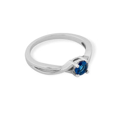 EMERALD AND SAPPHIRE TWISTED WHITE RING