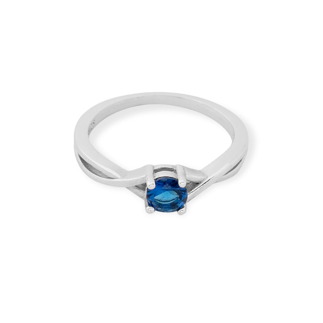 EMERALD AND SAPPHIRE TWISTED WHITE RING